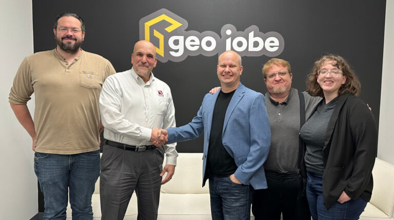 L-R: Eric Goforth, GEO Jobe’s chief technology office; CEO David Hansen shaking hands with Baron Weather VP of enterprise sales, Marc Krasner; chief operations officer Danny Menikheim, and chief support officer Courtney Menikheim