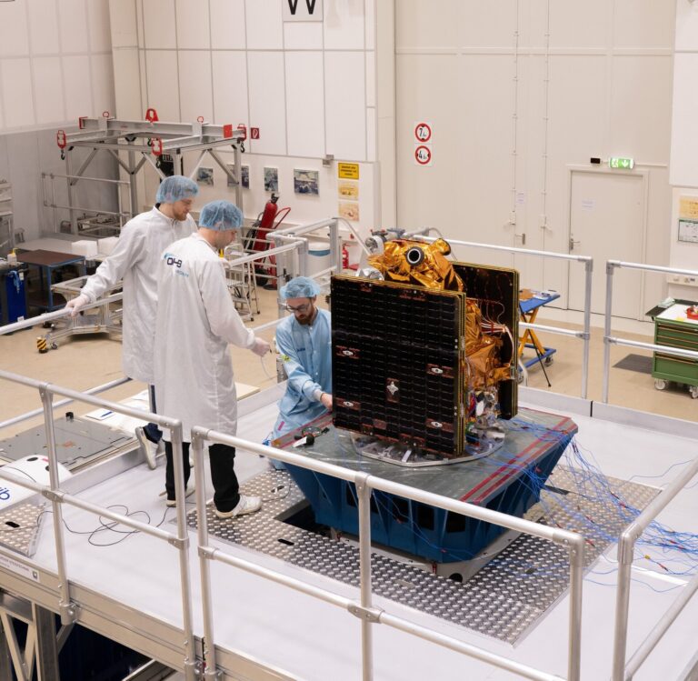 ESA researchers work on the Arctic weather satellite.