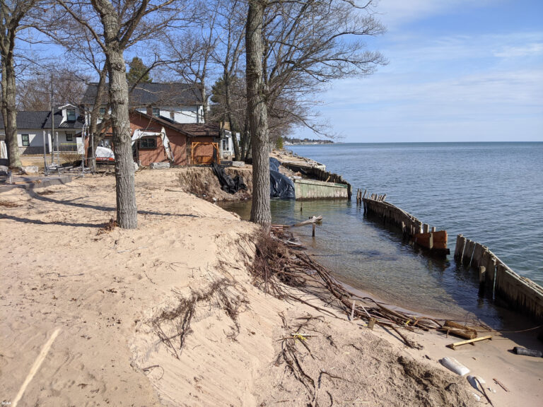 High water levels encroach on seawalls and lakeside property near the town of Oscoda, Michigan on Lake Huron.