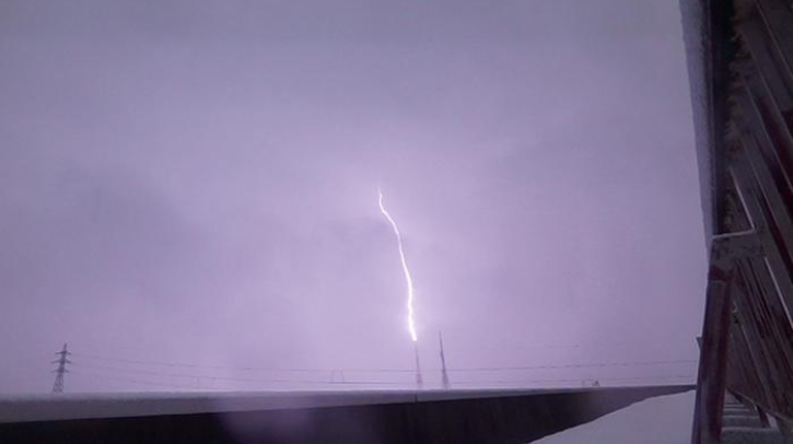 An upward positive leader that produced a downward terrestrial gamma-ray flash, extending from a television broadcast tower.