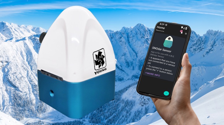 R M Young Company's Snodar and a phone showing the company's mobile app float against a snowy mountain backdrop